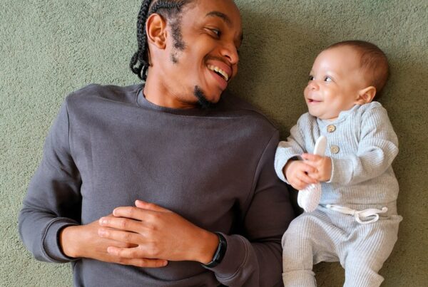 a person holding a baby
